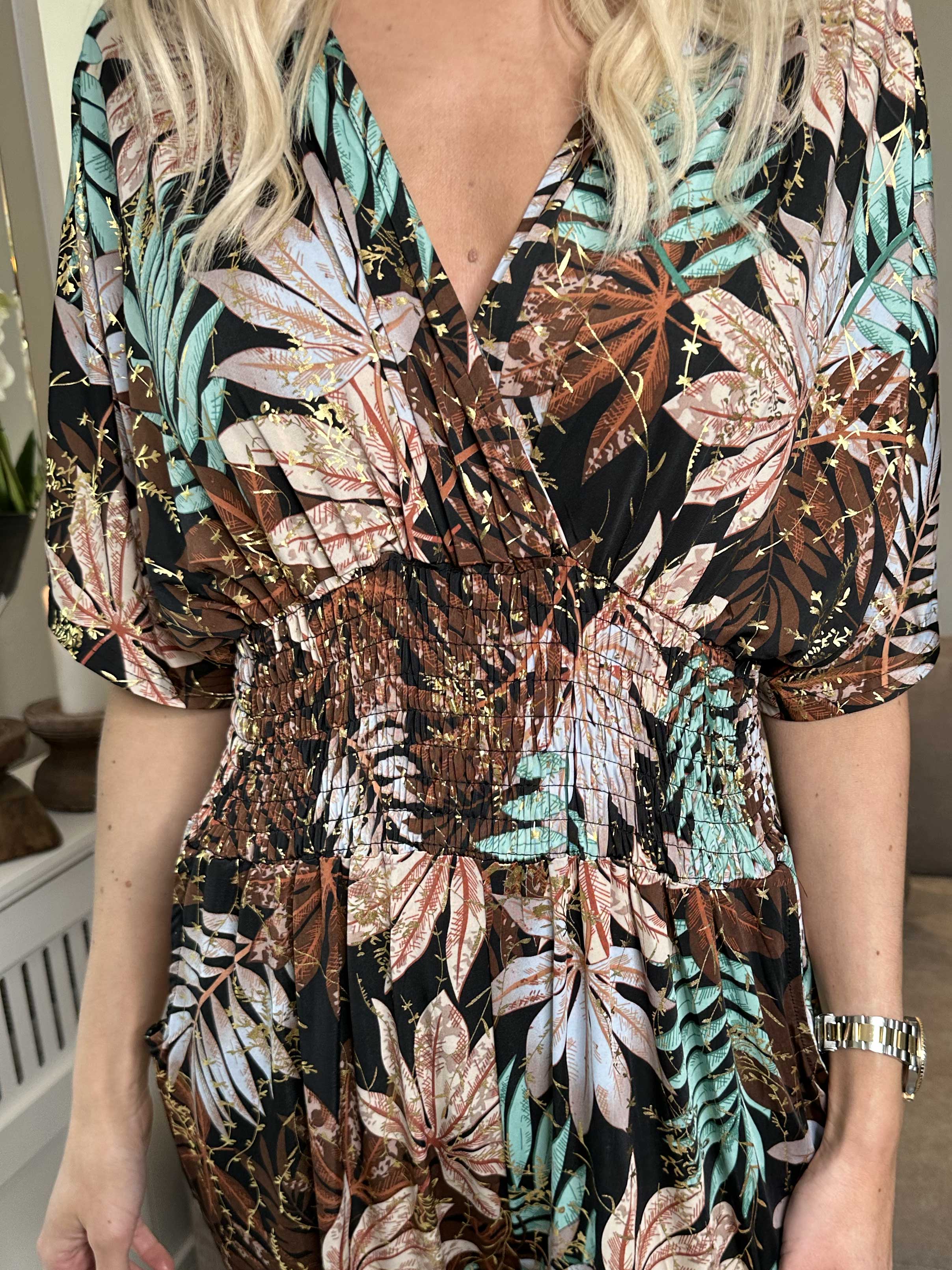 Pams Leaf Jumpsuit - Elastisk buksedragt med bladmønster